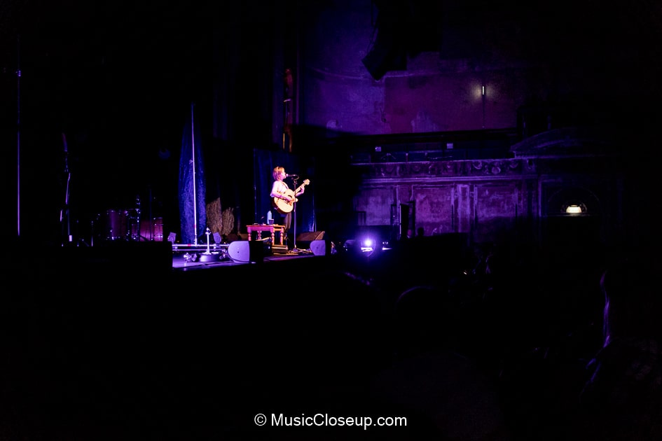 A long shot of Emily Barker playing at Alexandra Palace